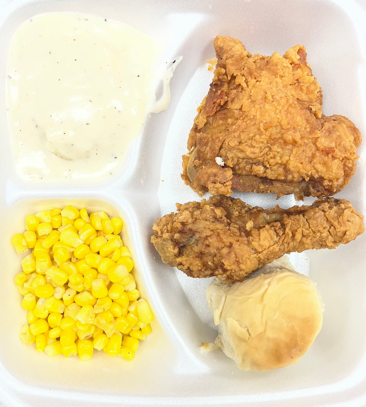 Chicken Thigh & Leg w/ Mashed Potatoes & Gravy, & a veg. (corn or green beans)